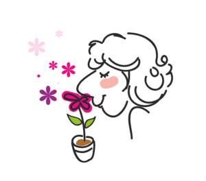 Woman smelling flowers.