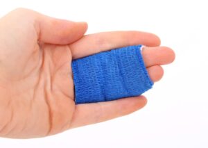A bandage on fingers is a consequence of moving injuries